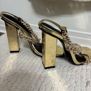 Gold block heels with rhinestone chains